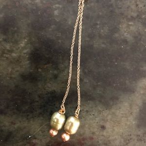 4.5” thread chain dyed pearl earrings . One of a kind Elegant and flattering.
